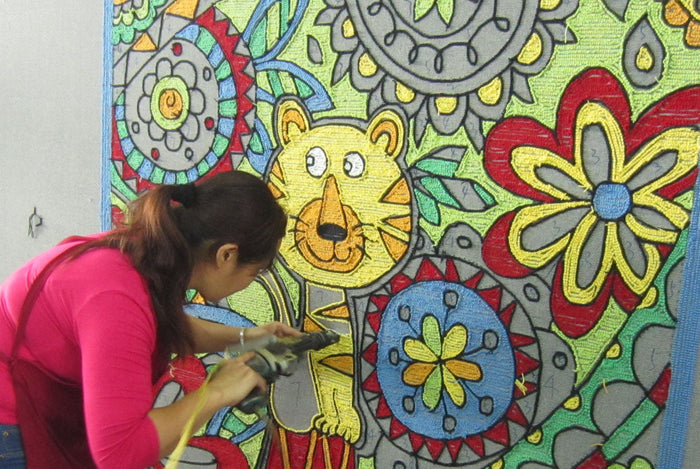 Was ist ein handgetufteter Teppich?