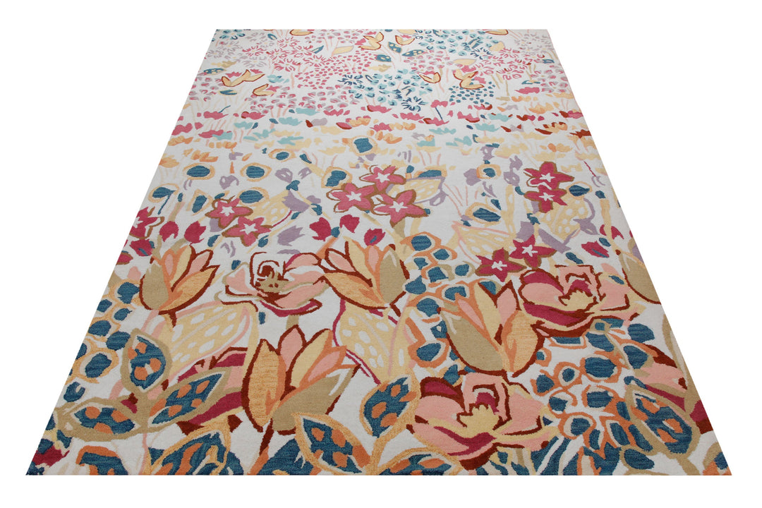 Blütenwiese in Creme - Handtuft Wolle 160 x 230 cm – Teppich im Raum platziert