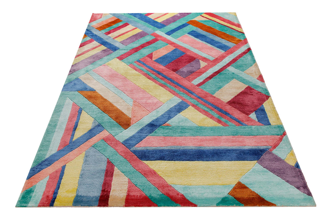 Aquarell-Geflecht in Pastell - Handtuft Viskose 160 x 230 cm – Teppich im Raum platziert
