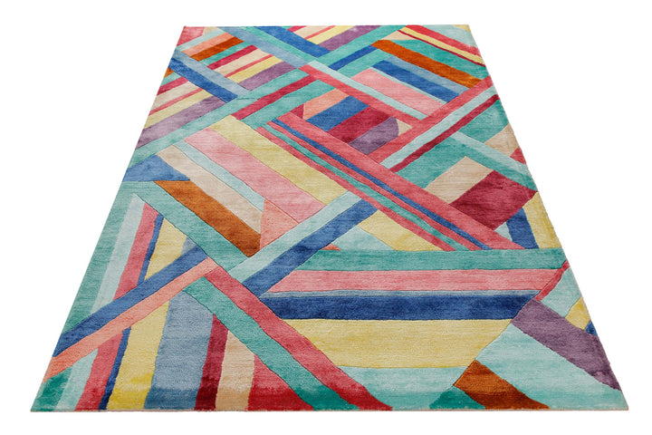 Aquarell-Geflecht in Pastell - Handtuft Viskose 160 x 230 cm – Teppich im Raum platziert