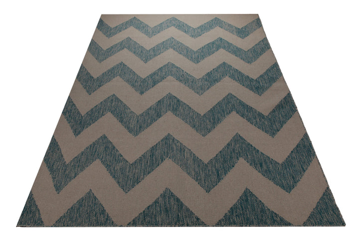 Handwebteppich Wolle Chevron petrol taupe 160x230 cm – im Wohnambiente arrangiert