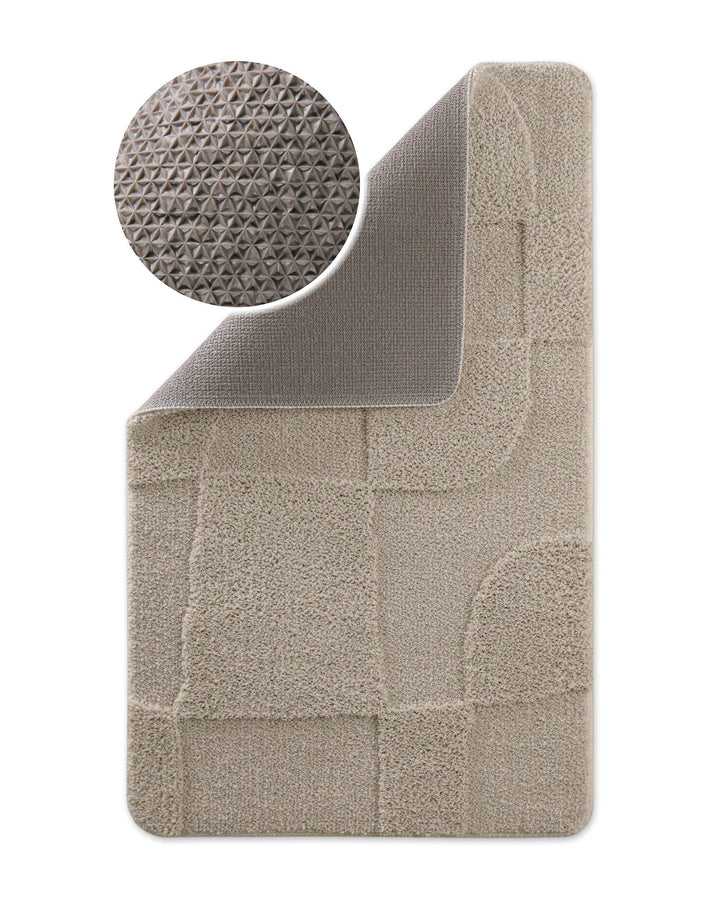 Badteppich Davie Grau Ecke hochgeklappt, runde Probe zeigt graue Rückseite mit rutschhemmender Beschichtung