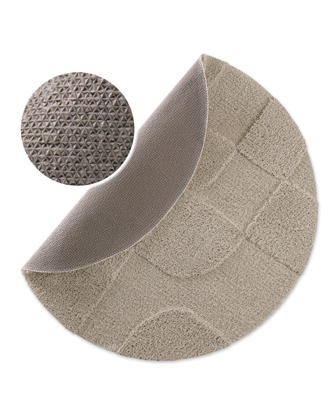 Badteppich Davie Grau rund, angehobene Ecke zeigt graue Rückseite mit rutschhemmender Beschichtung