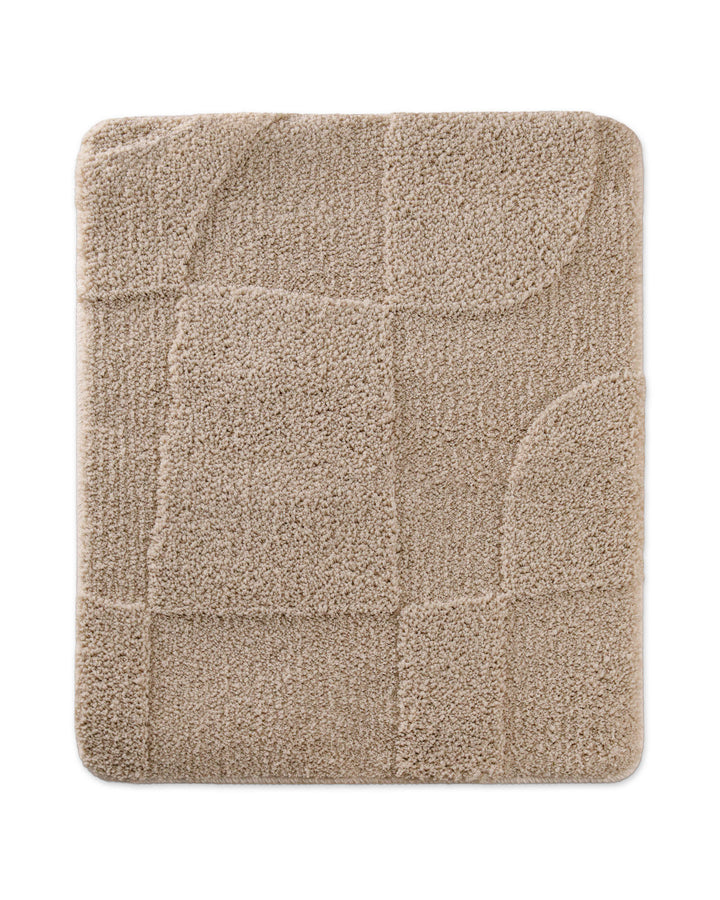 Badteppich Davie Sand Beige rechteckig 55x65 cm, Draufsicht auf Matte mit eingeprägtem Linienmuster auf hellem Hintergrund