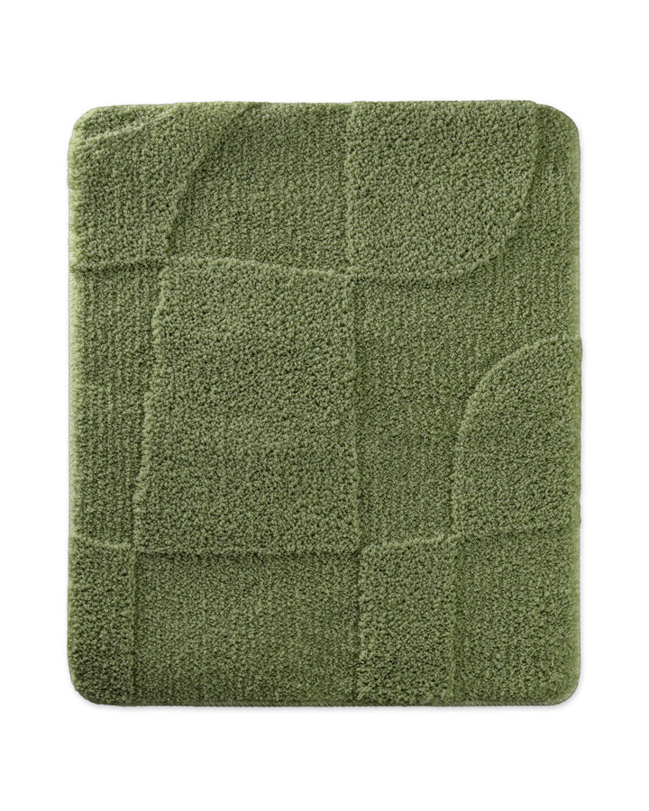 Badteppich Davie Reseda Grün rechteckig 55x65 cm, Draufsicht auf Matte mit eingeprägtem Linienmuster auf hellem Hintergrund