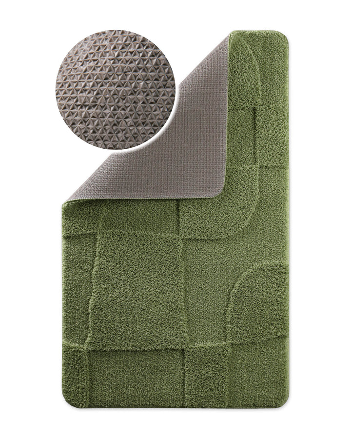 Badteppich Davie Reseda Grün Ecke hochgeklappt, runde Probe zeigt Reseda Grüne Rückseite mit rutschhemmender Beschichtung