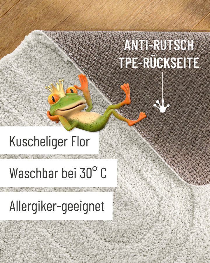 Badteppich Fiete Weiß Detailaufnahme Flor auf Holzfußboden, eingeblendete Hinweise zu rutschhemmender Rückseite und Waschbarkeit