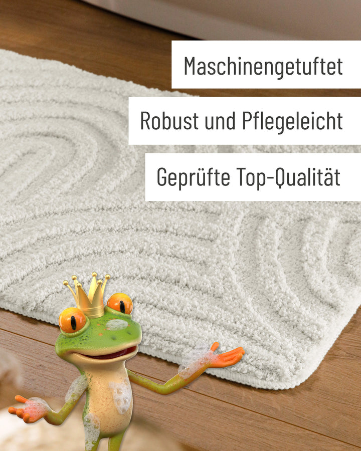 Badteppich Fiete Weiß Detail der Teppichkante auf Holzfußboden, eingeblendete Hinweise zu Verarbeitung und Pflege