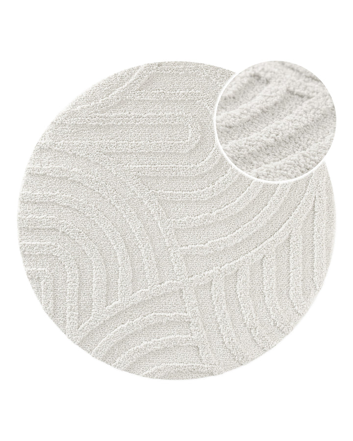 Badteppich Fiete Weiß rund, Draufsicht mit Detailkreis der Florstruktur und eingeprägtem Linienmuster auf hellem Hintergrund