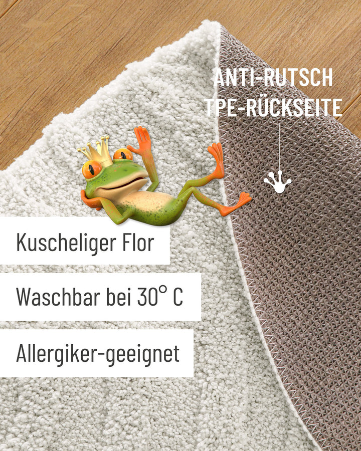 Badteppich Fiete Weiß Detailaufnahme mit umgeschlagener Ecke, Hinweisgrafik zur rutschhemmenden Rückseite und Waschbarkeit