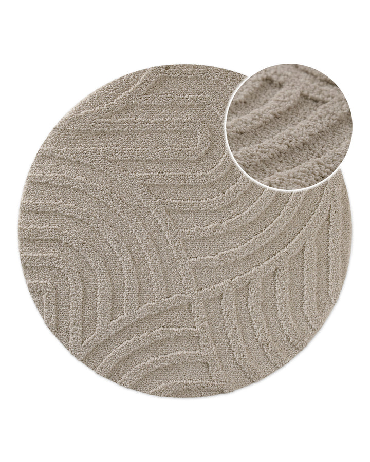 Badteppich Fiete Grau rund, Draufsicht mit Detailkreis der Florstruktur und eingeprägtem Linienmuster auf hellem Hintergrund