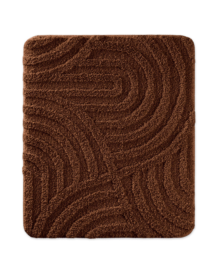 Badteppich Fiete Braun rechteckig 55x65 cm, Draufsicht auf Matte mit eingeprägtem Linienmuster auf hellem Hintergrund
