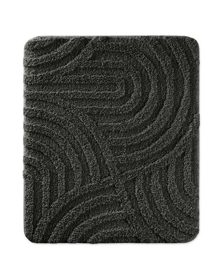 Badteppich Fiete Anthrazit Grau rechteckig 55x65 cm, Draufsicht auf Matte mit eingeprägtem Linienmuster auf hellem Hintergrund