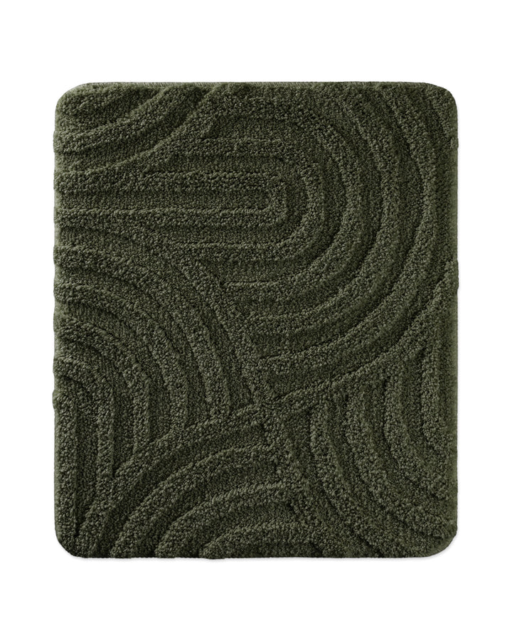 Badteppich Fiete Kiefer Grün rechteckig 55x65 cm, Draufsicht auf Matte mit eingeprägtem Linienmuster auf hellem Hintergrund