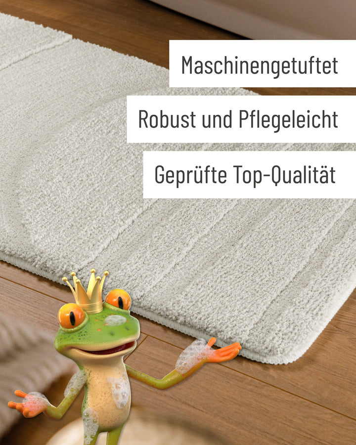 Badteppich Marc Weiß Detail der Teppichkante auf Holzfußboden, eingeblendete Hinweise zu Verarbeitung und Pflege