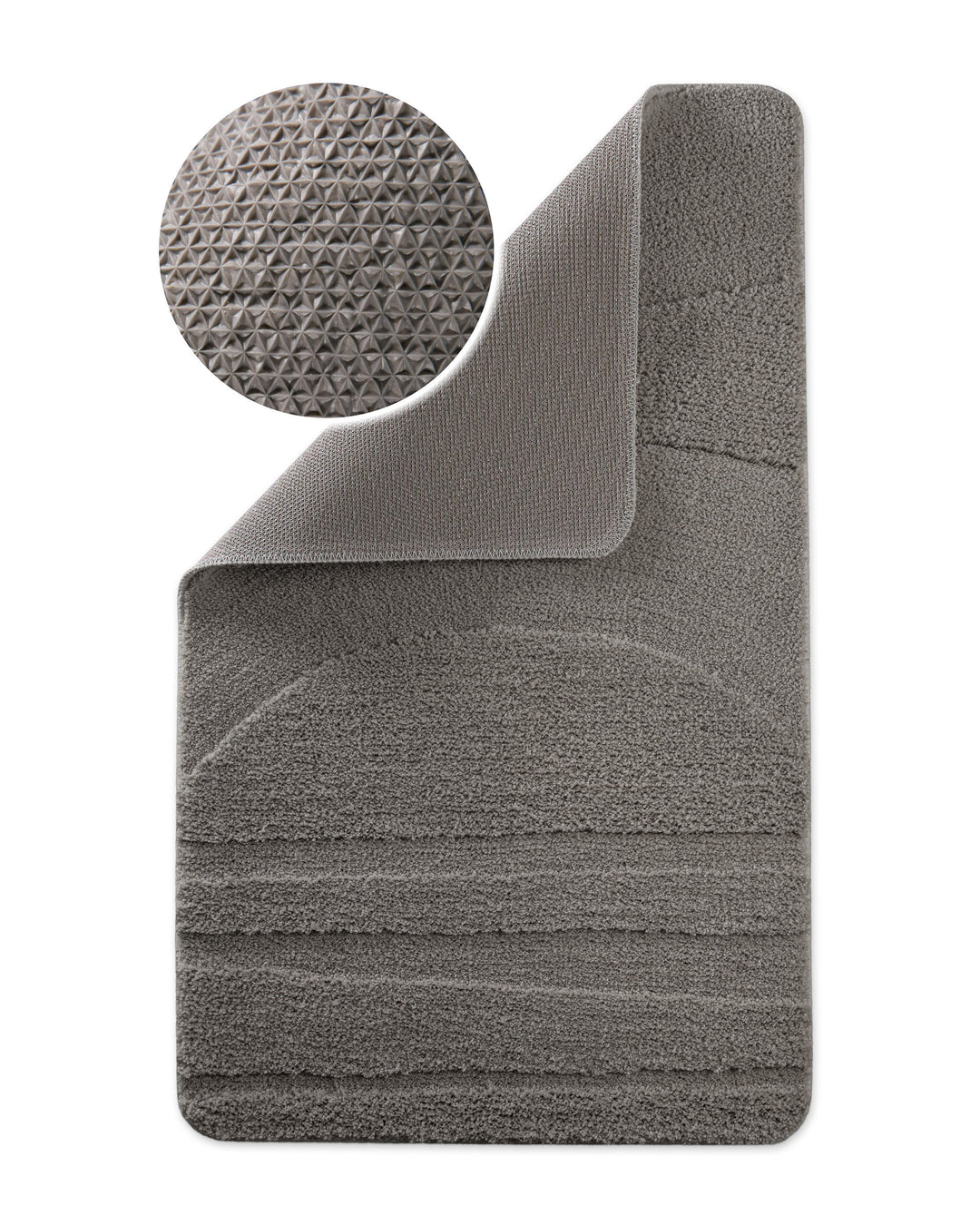 Badteppich Marc Basalt Grau Ecke hochgeklappt, runde Probe zeigt Basalt Graue Rückseite mit rutschhemmender Beschichtung
