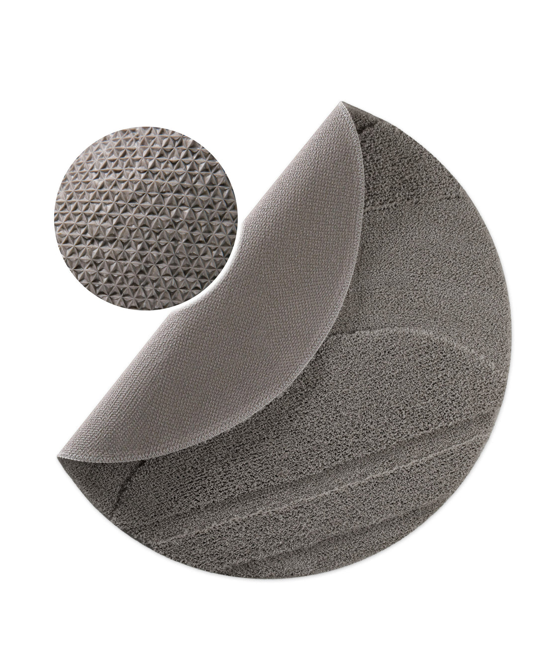 Badteppich Marc Basalt Grau rund, angehobene Ecke zeigt Basalt Graue Rückseite mit rutschhemmender Beschichtung