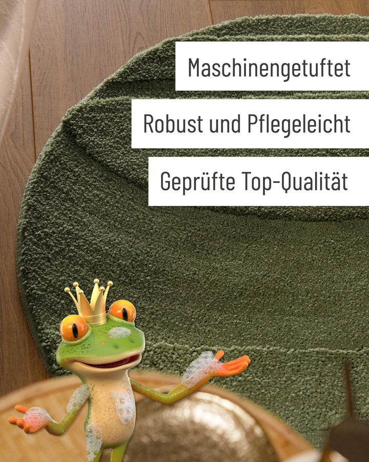 Badteppich Marc Kiefer Grün rund Detail der Teppichkante mit Hinweisen zu maschinengetufteter Verarbeitung