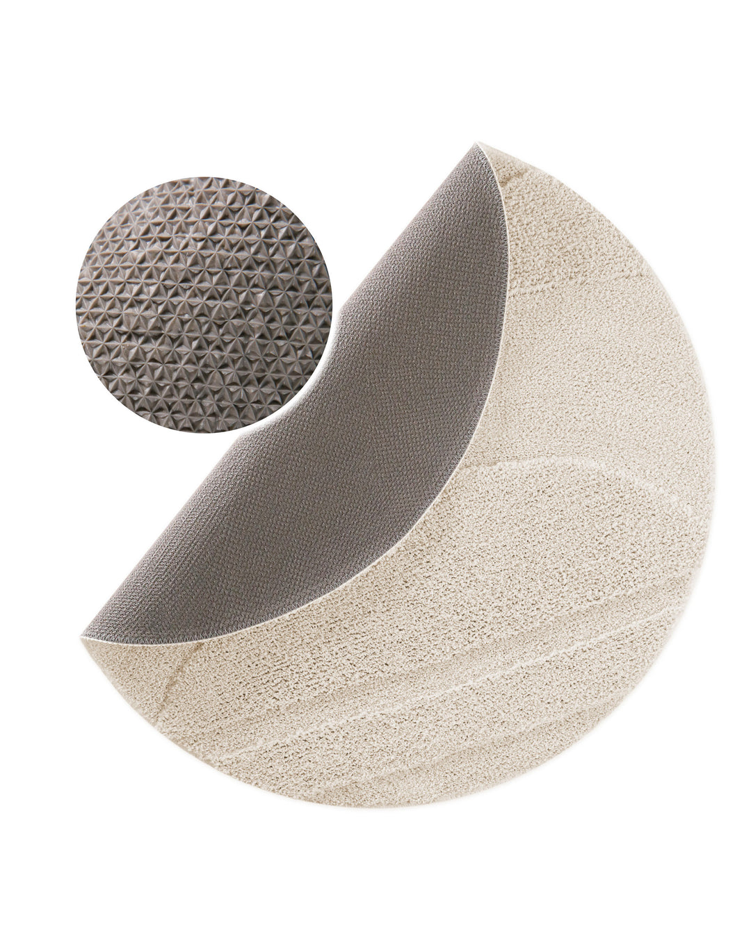 Badteppich Marc Creme Weiß rund, angehobene Ecke zeigt Creme Weiße Rückseite mit rutschhemmender Beschichtung