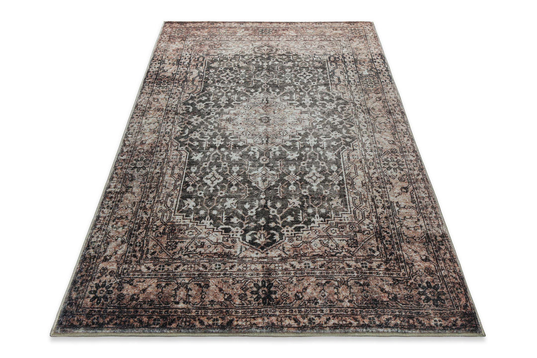 Beige-grauer Vintage-Badteppich Ralph in perspektivischer Ansicht mit dekorativem Ethno-Design.