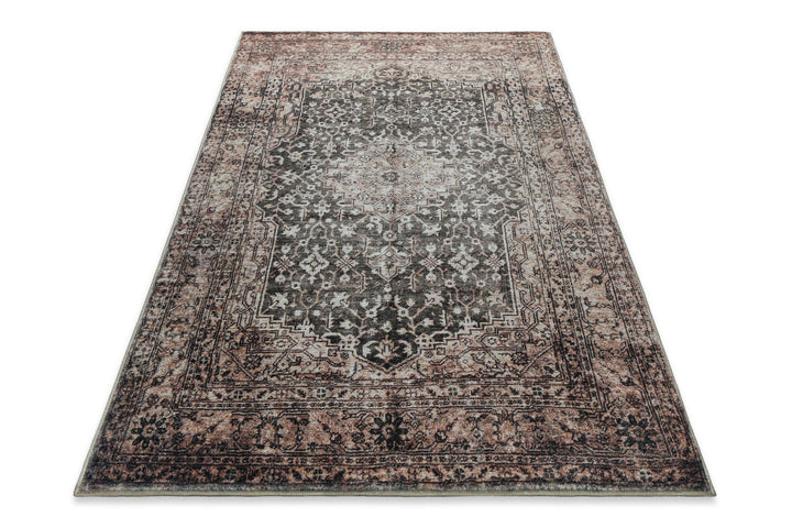 Beige-grauer Vintage-Badteppich Ralph in perspektivischer Ansicht mit dekorativem Ethno-Design.
