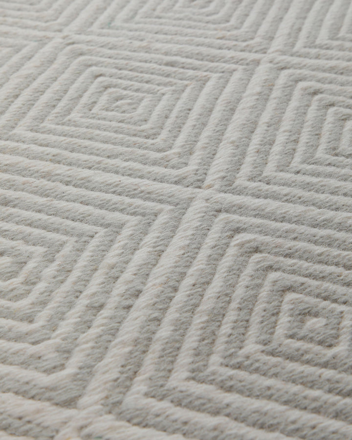 Handwebteppich Wolle Rautenmuster creme 160x230 cm – Nahaufnahme der Farbgebung