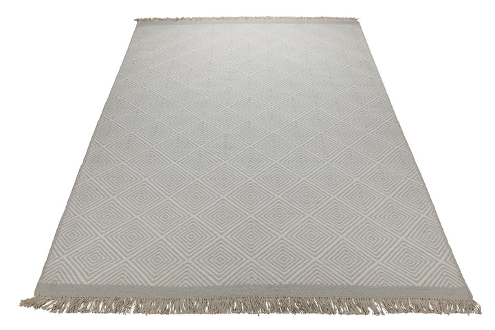 Handwebteppich Wolle Rautenmuster creme 160x230 cm – Lifestyle-Aufnahme im Interieur