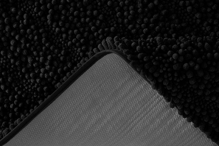 Rückseite des Cooper-Teppichs mit Anti-Rutsch-Beschichtung, umgeschlagene Ecke