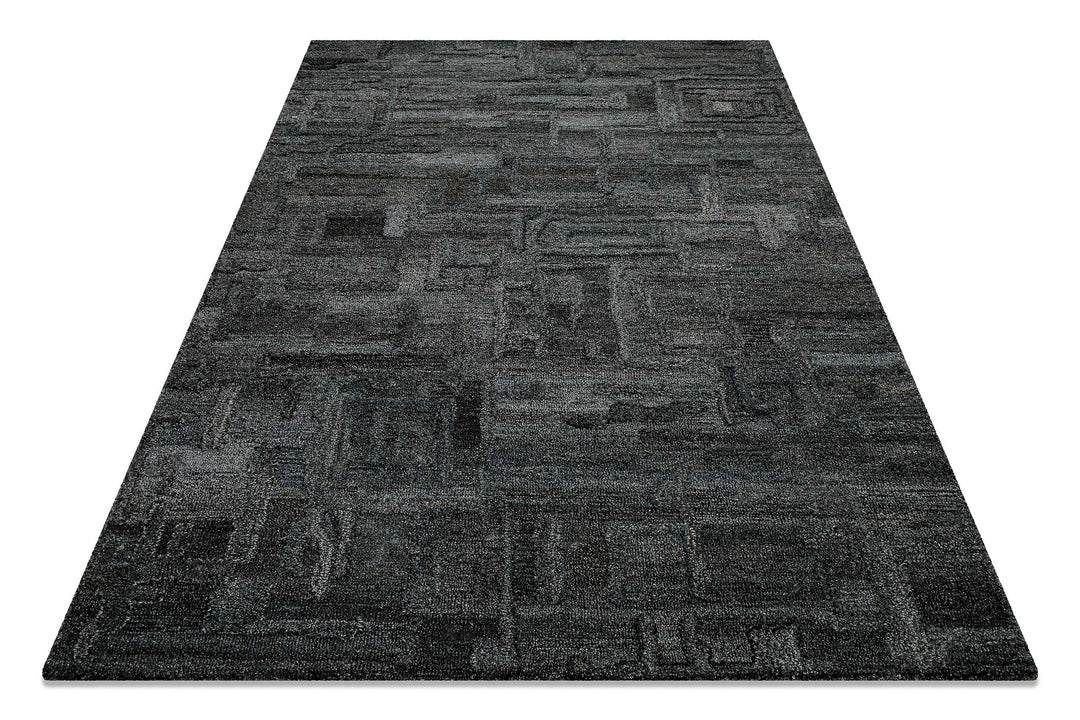 Schräg fotografierter Hamptons FORTYTWO Wohnteppich, der die besondere Oberflächenstruktur und das Design betont.