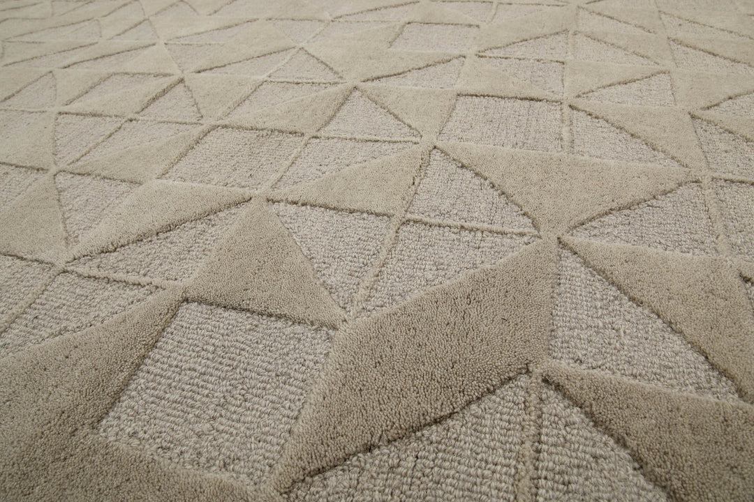 Detaildarstellung der Webstruktur des Hamptons THIRTYSEVEN Teppichs mit präziser Musterführung.