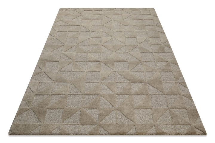 Schräg aufgenommener Hamptons THIRTYSEVEN Wohnteppich, der die besondere Textur und das Design betont.