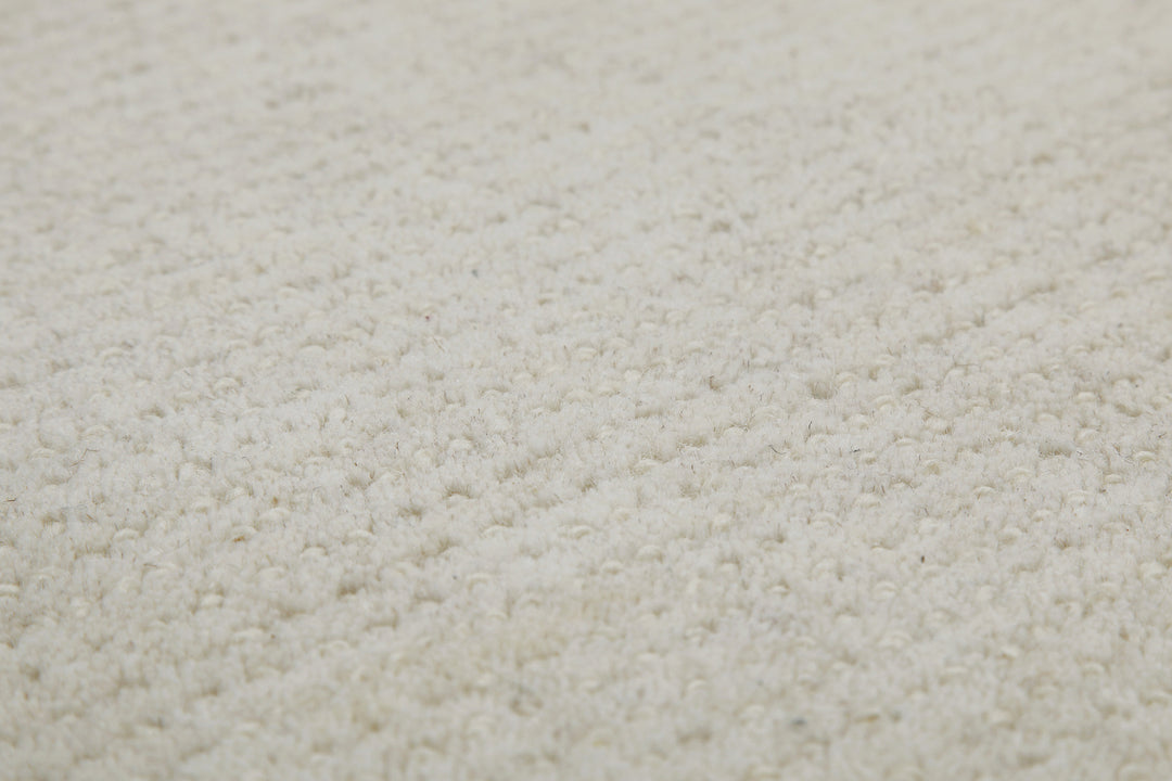 Detailbild des Hamptons THIRTYTWO Wohnteppichs mit sichtbar strukturierter Floroptik und moderner Ausstrahlung.