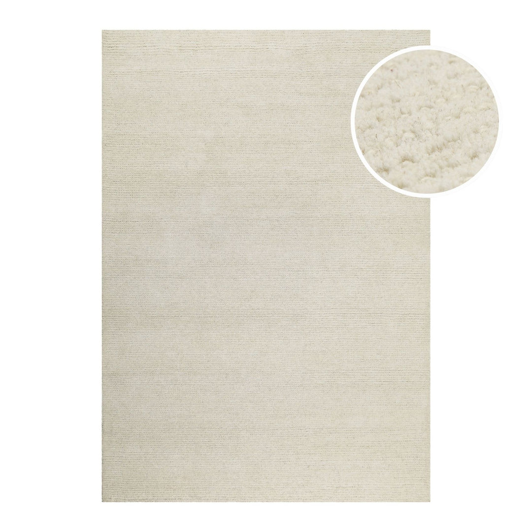 Hochwertiger Teppich aus der WECONhome Hamptons Kollektion, rechteckig freigestellt mit strukturbetonter Detailaufnahme.