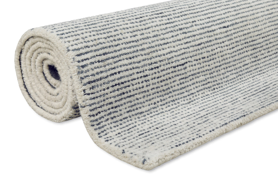 Makroaufnahme der strukturierten Floroberfläche des Hamptons THIRTYTWO mit gleichmäßigem Musterbild.