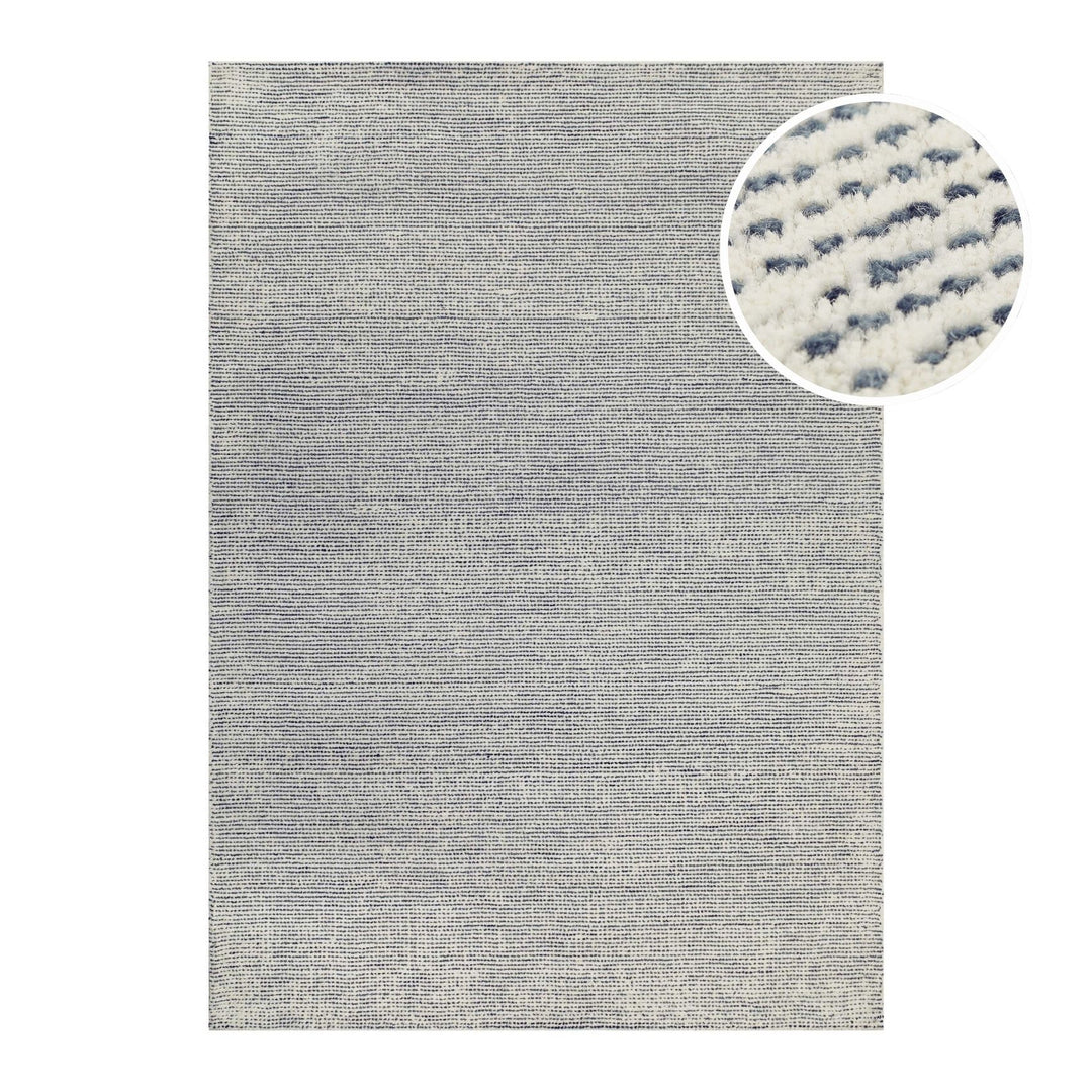 Freigestelltes Produktbild des Teppichs  THIRTYTWO in creme-beige blau aus der Hamptons Kollektion mit Detail