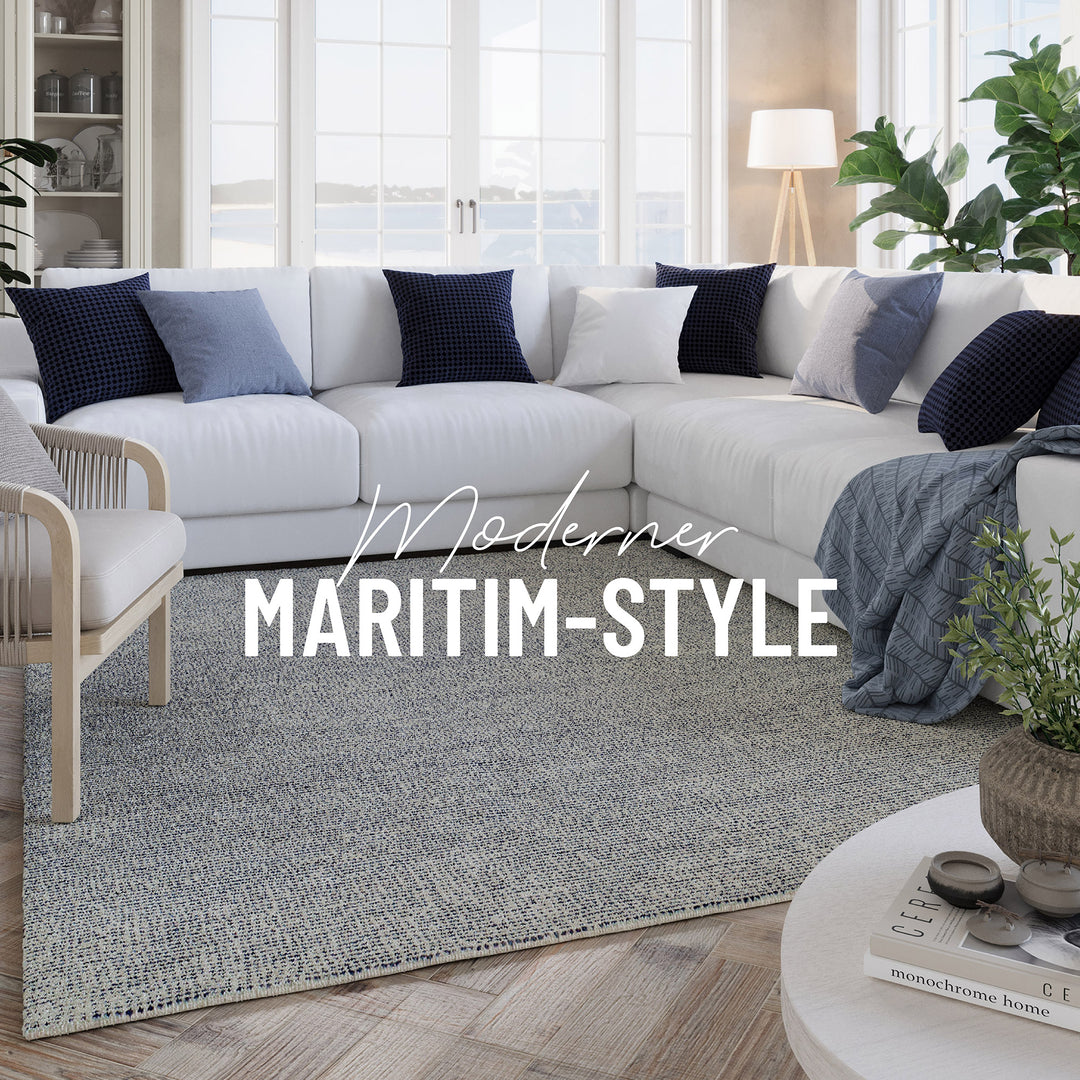 Detail der seitlichen Teppicheinfassung beim Hamptons THIRTYTWO mit sauber gearbeiteter Kante.