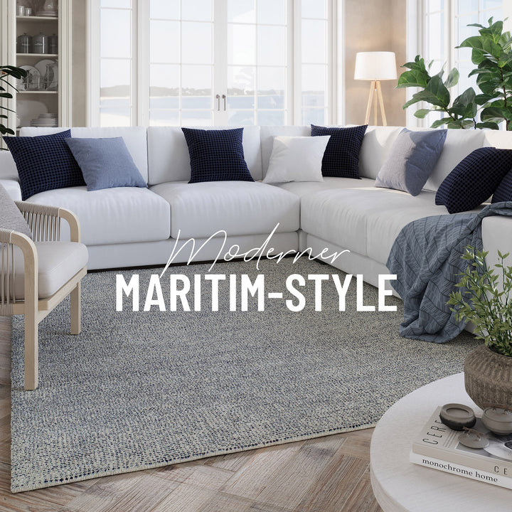 Detail der seitlichen Teppicheinfassung beim Hamptons THIRTYTWO mit sauber gearbeiteter Kante.