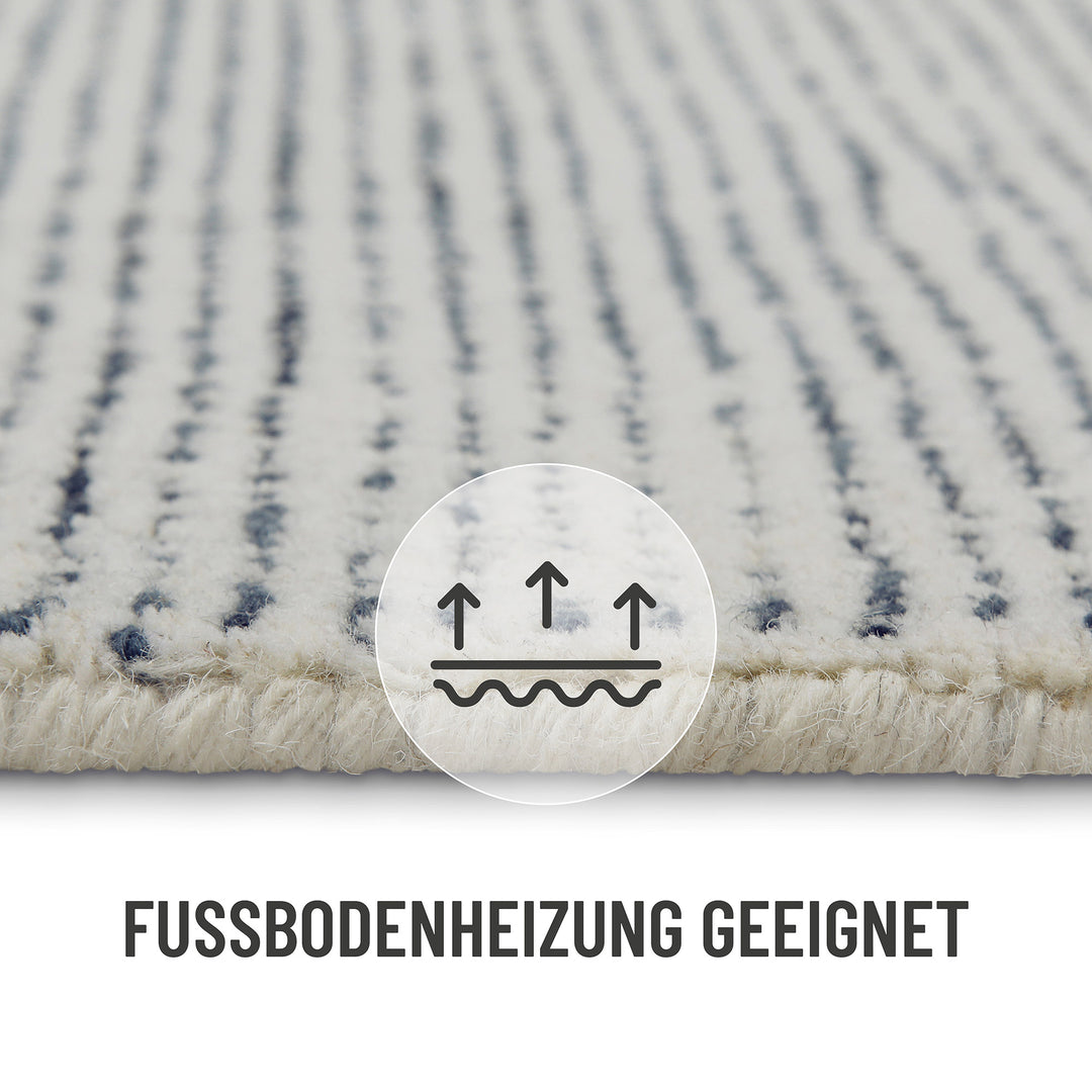 Präzise verarbeitete Teppichkante des Hamptons THIRTYTWO mit Info: Fußbodenheizung geeignet.