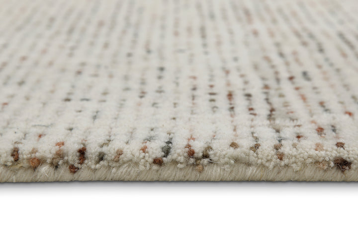 Detailansicht der Oberfläche des Hamptons THIRTYTWO Teppichs mit fein abgestimmter Webstruktur.