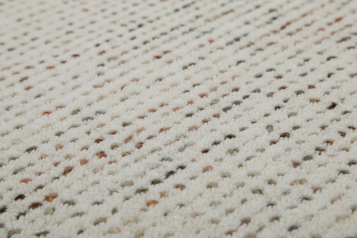 Makrodetail des Hamptons THIRTYTWO Wohnteppichs mit hochwertiger Verarbeitung und strukturierter Optik.