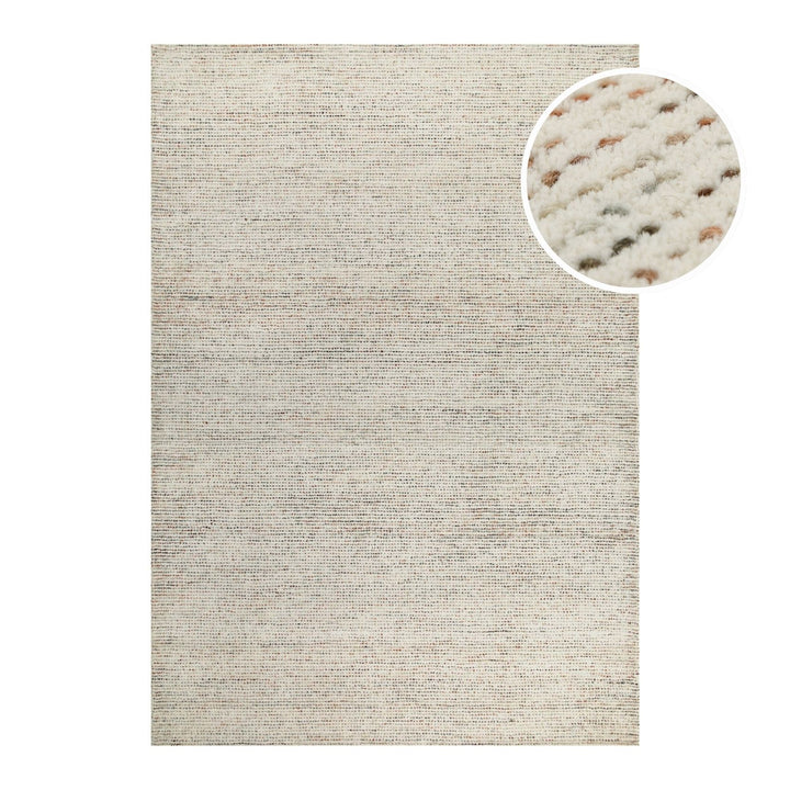 Freigestelltes Produktbild des Teppichs  THIRTYTWO in creme- beige mit bunten Details aus der Hamptons Kollektion