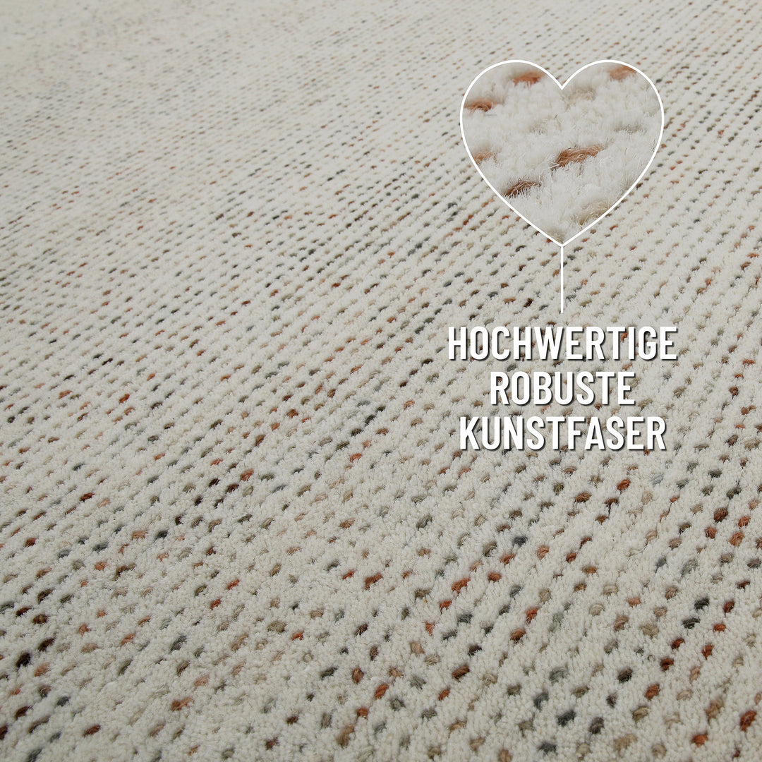 Detail des Teppichrands beim Hamptons THIRTYTWO mit hochwertiger Einfassung und klarer Struktur.