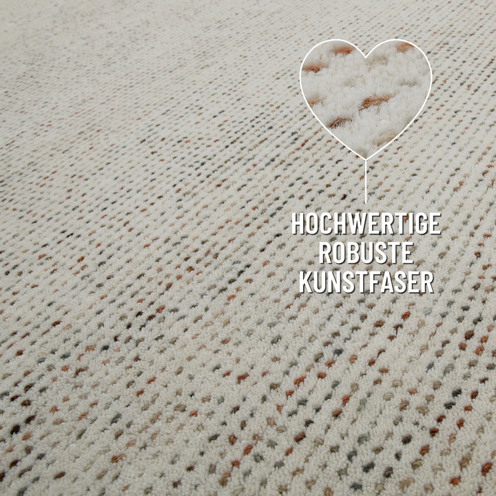 Detail des Teppichrands beim Hamptons THIRTYTWO mit hochwertiger Einfassung und klarer Struktur.