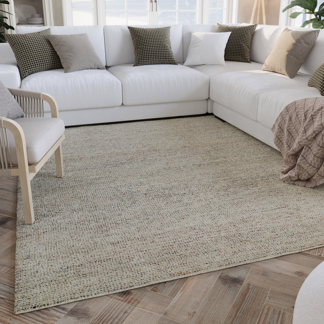 Innenraumszene mit Hamptons THIRTYTWO Teppich, der dem Wohnbereich Wärme und Struktur verleiht.