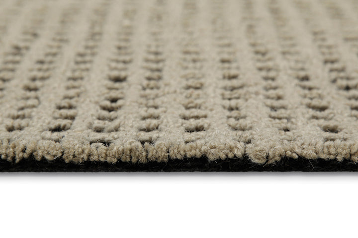 Detailaufnahme des Hamptons TWENTYNINE Teppichs mit klar erkennbarer Webstruktur und präziser Musterführung im Flor.