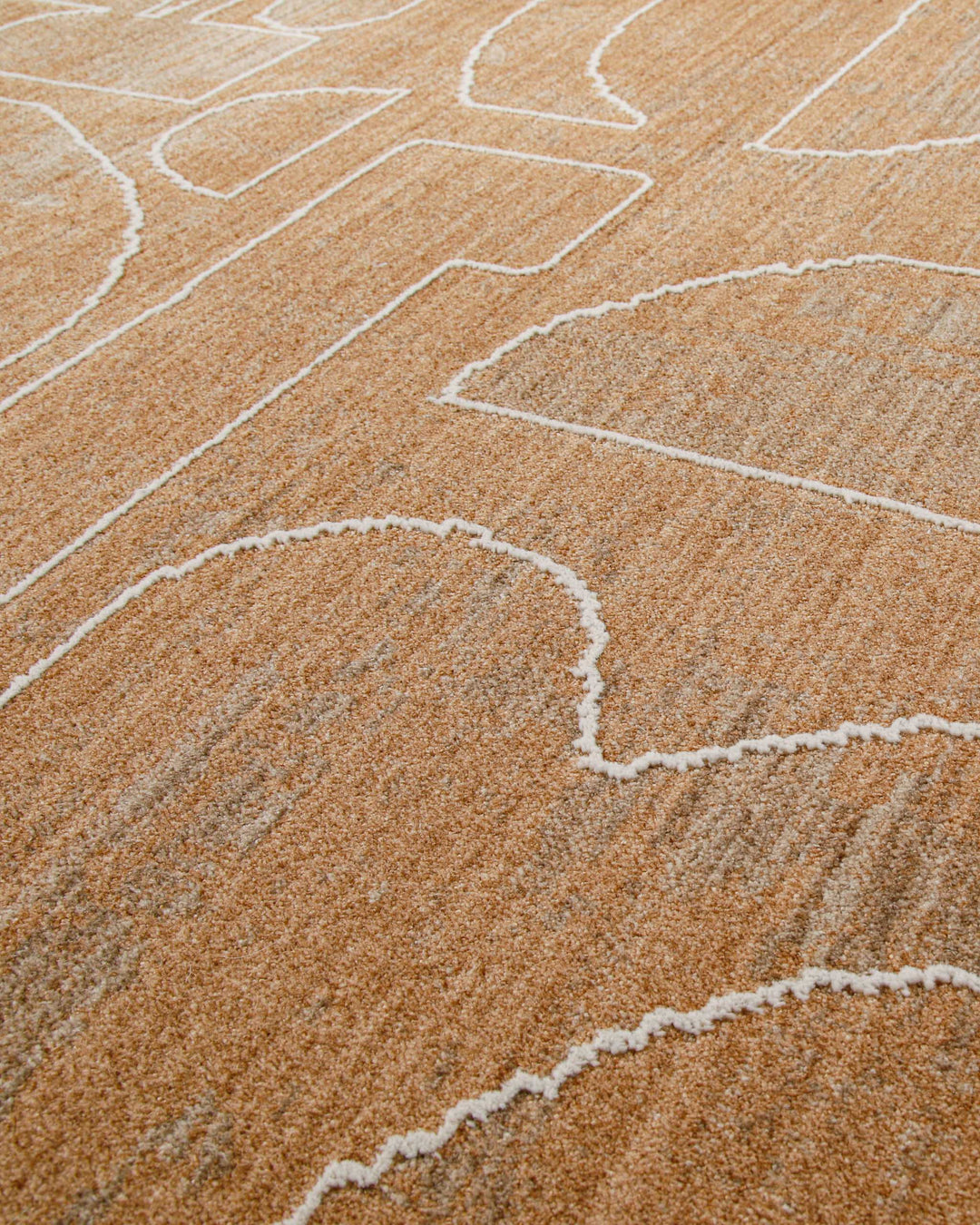 Kurzflor Teppich Beatle-B in Braun Bunt Detailaufnahme des abstrakten Musters auf strukturierter Oberfläche