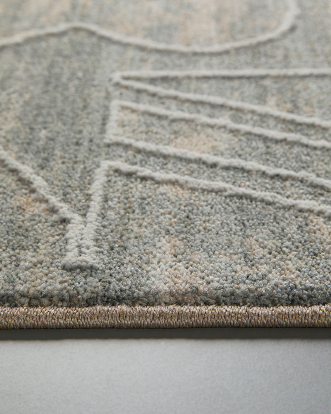 Kurzflor Teppich Beatle-B in Türkis Grau Nahaufnahme der weichen Oberflächenstruktur und Musterdetails