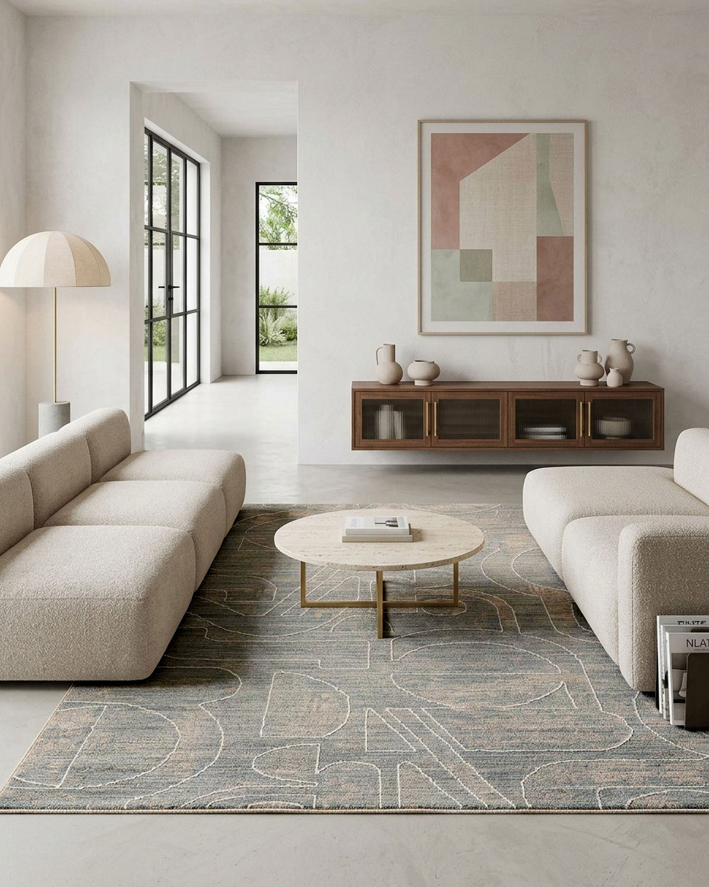 Kurzflor Teppich Beatle-B in Türkis Grau mit modernem abstraktem Muster im Wohnzimmer vor Sofa und Wohnmöbeln