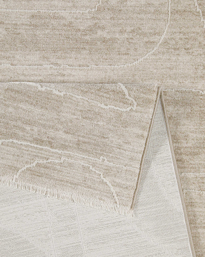 Kurzflor Teppich Beatle-B in Beige Bunt Detailaufnahme der Teppichkante und hochwertigen Verarbeitung