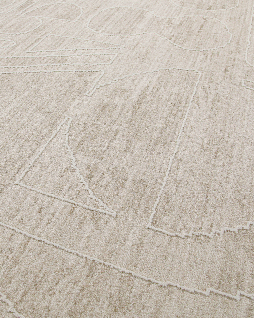 Kurzflor Teppich Beatle-B in Beige Bunt Detailaufnahme des abstrakten Musters auf strukturierter Oberfläche